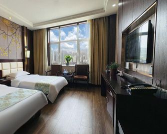 Xuehe Manbo Hotel - Linxia - Bedroom