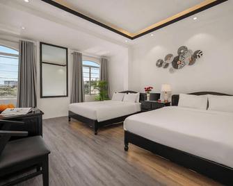 Huong Duong Hotel - Hué - Slaapkamer