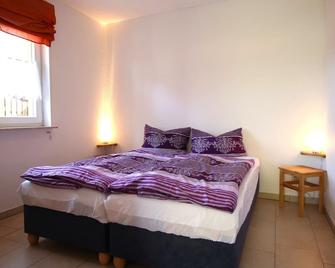 Ground floor apartment - House Fam. Lüttig, TZR 27596 - Wiek - Schlafzimmer