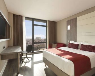 Ramada Encore by Wyndham Istanbul Bayrampasa - איסטנבול - חדר שינה