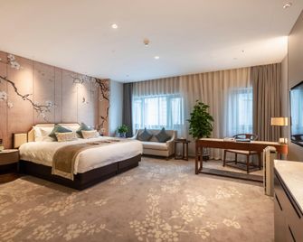 New Era International Hotel - نانجينغ - غرفة نوم