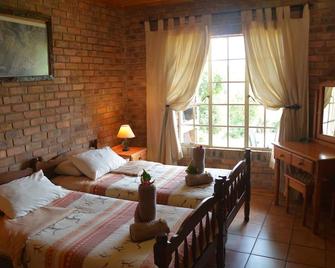 Thaba Tsweni Lodge & Safaris - Graskop - Schlafzimmer