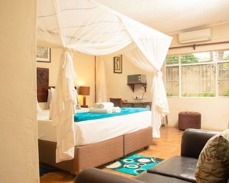 Inkindaba Guest Lodge - Victoria Falls - Habitación