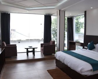 Hotel Rhodo Inn Dhanaulti - Dhanaulti - Habitación