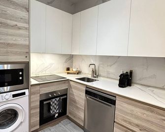 Urban Suites Aluche - Madrid - Küche