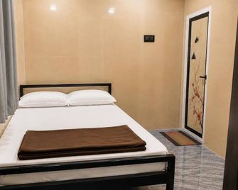 Joy Ac Hall & Family Rooms - Rameswaram - Schlafzimmer