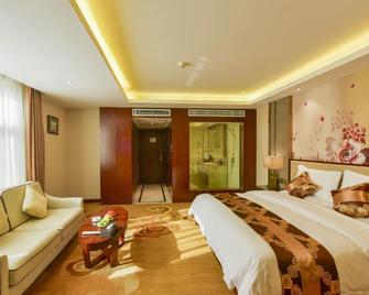 Huachen International hotel - Zhangye - Bedroom