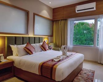 Hotel Grand Ajantha - Changanācheri - Habitación