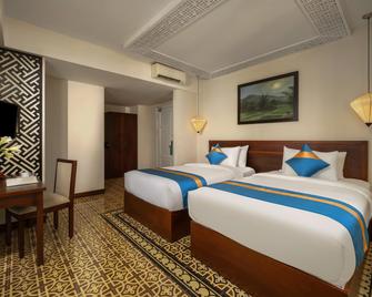 Royal Riverside Hoi An Hotel - Hoi An - Κρεβατοκάμαρα