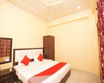 오요 36989 호텔 솔리테어 - Tanakpur - 침실