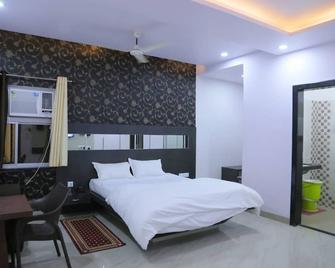 Hotel Saraogi - Gaya - Bedroom