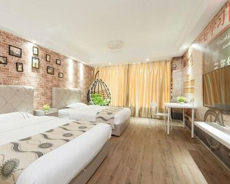 Yicheng Apartment Hotel (Guangzhou East Railway Station Vili International) - Kanton - Sypialnia