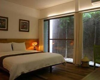 روماه توري إيكو هوتل - سوراكارتا - غرفة نوم