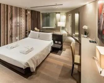 Suites Hotel Astor - Belluno - Bedroom