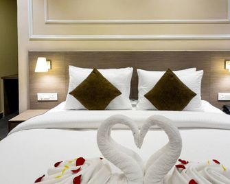 Pride Hotel And Resort Rishikesh - Rishikesh - Makuuhuone