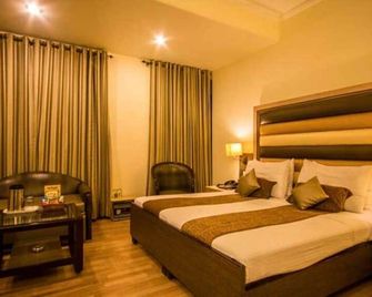 The Suncourt Hotel Yatri - ניו דלהי - חדר שינה