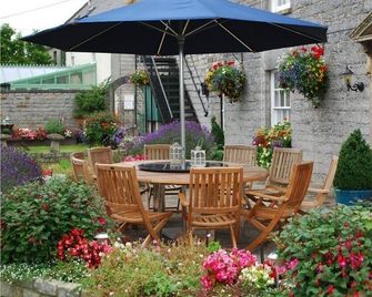 Riverside Family room (quad) - Wells - Patio