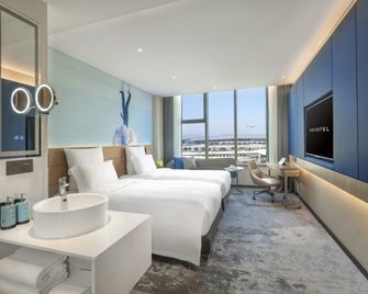 Novotel Guangzhou Baiyun Airport - Kanton - Sypialnia