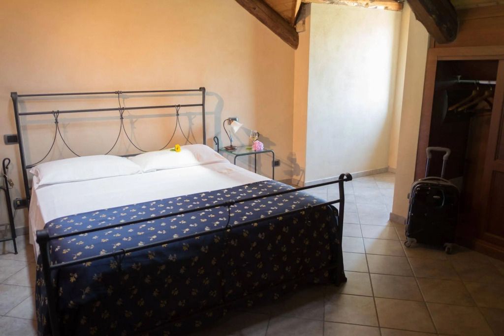 Hotel Le Botti - אלבה - חדר שינה