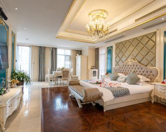 Xi'erdun Roman Holiday Hotel - Lishui - Schlafzimmer