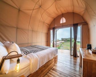 The Dewi Bedugul - Baturiti - Schlafzimmer