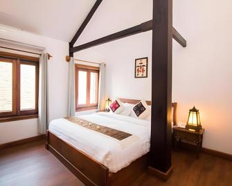 Royal Peacock Boutique Hotel - Luang Prabang - Phòng ngủ