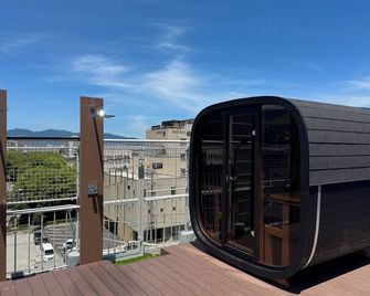 Capsule Hostel Beppu Tower - Beppu - Balcony