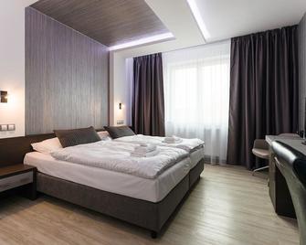 Hotel U Kostela - Rajhradice - Habitación