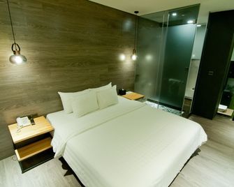 虎尾春秋文創設計旅店 - 虎尾鎮 - 臥室