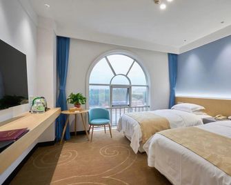 Fusheng Hotel - Qingdao - Yatak Odası