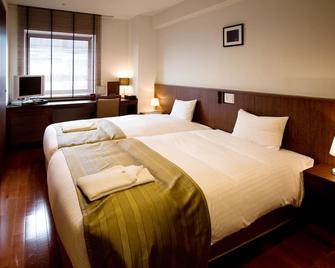 ساتون هوتل هاكاتا سيتي - فوكوكا - غرفة نوم