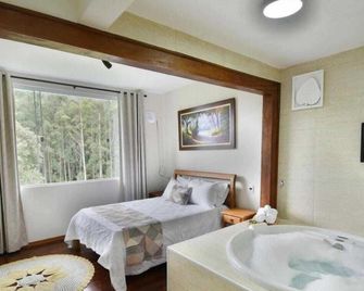 MD Luar da Montanha - Monte Verde - Bedroom