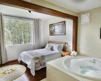 م د لوار دا مونتانيا - Monte Verde - غرفة نوم