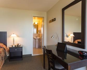 Motel et Appartements du Fleuve - Brossard - Habitación