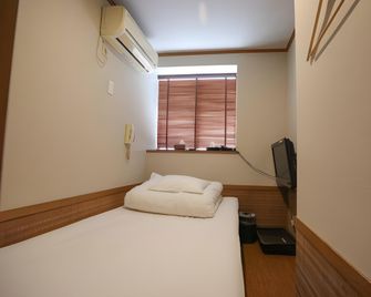 Putit Hotel Cosmos - Tóquio - Quarto