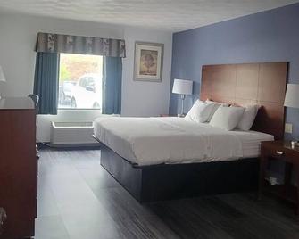 Royal Inn & Suites - Akron - Habitación
