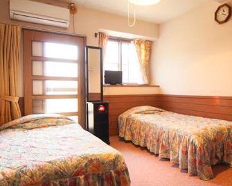 Pension Akanegumo - Minamiaso - Slaapkamer