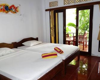 Banana Leaf Bungalow - Pemenang - Habitación