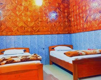 Al-Amarat Hotel Saddar - Karatschi - Schlafzimmer