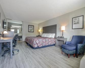 Executive Inn Locust Grove By Capital O - Locust Grove - Bedroom