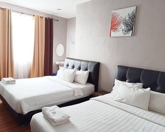 Hotel Kamelia - Kepala Batas - Habitación