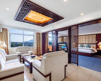 Wandu Hotel - Wanning - Bedroom