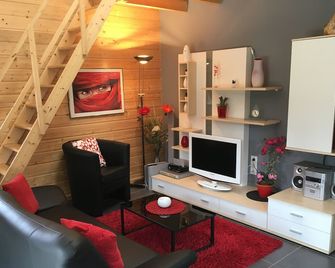 Chalet 4 Personnes avec jacuzzi et piscine partagée - Corcieux - Salon