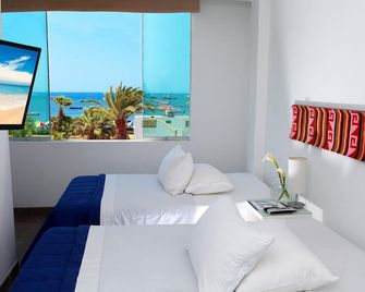 Hotel Gran Palma Paracas - פאראקס - חדר שינה