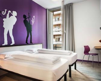 Hotel Nologo - ג'נואה - חדר שינה