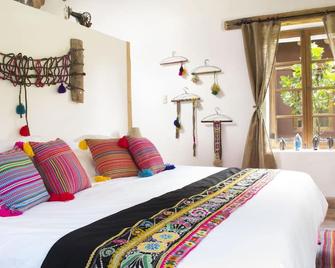 Nunu Boutique Hotel - Lamay - Habitación