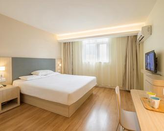 Hanting Hotel Xichang Qionghai Wetland Park - Liangshan - Habitación