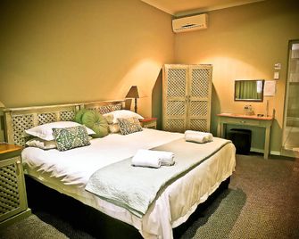 The Kraal Addo Guesthouse - אדו - חדר שינה