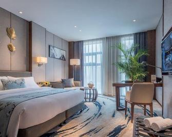 Yannian Plaza Hotel - Zhuzhou - Bedroom