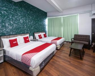 OYO 89840 69 Room 4 Stay - Sibu - Slaapkamer